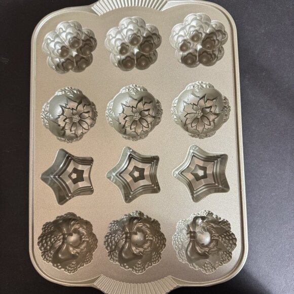 Nordic Ware Holiday Mini Muffin Pan 4 Different patterns star, wreath, Trees - Picture 9 of 16